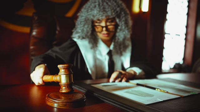 https://www.pexels.com/photo/judge-in-courtroom-making-a-ruling-34817076/